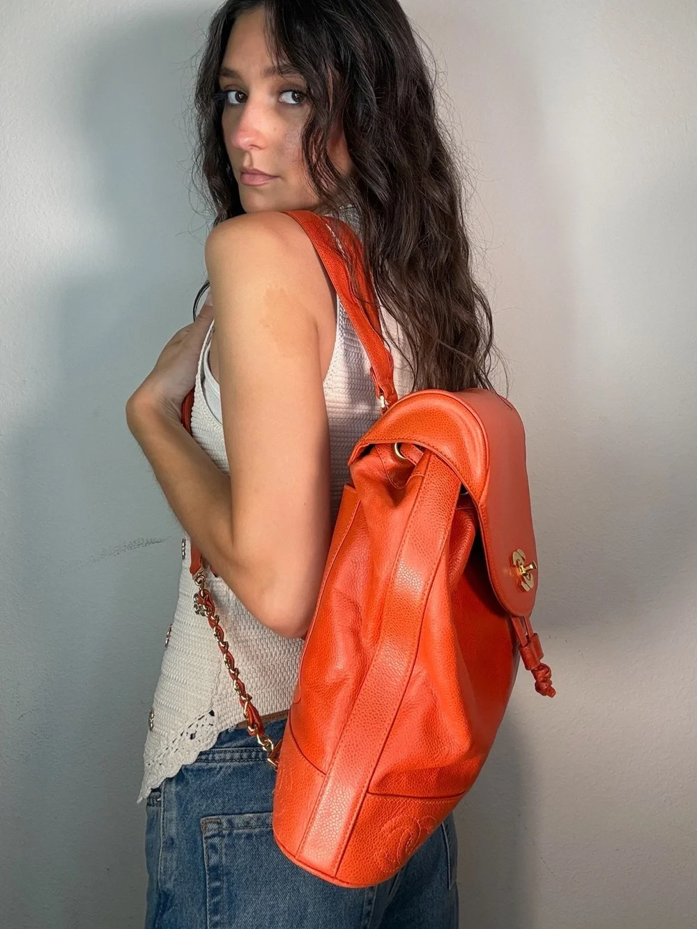 CHANEL Orange Caviar Leather Backpack with CC Trim and Gold Hardware